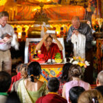 Gene Smith presents a hard drive of Buddhist texts to Chokyi Nyima Rinpoche in Kathmandu.