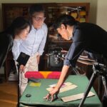 Scanning Buddhist texts at Mentsekhang Library, India.