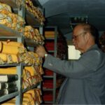 Gene Smith with his collection of Tibetan Buddhist texts.